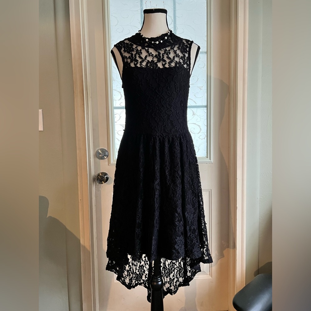 Material Girl size M lace over lining high neck, racer back, visible back zipper